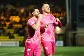 Hearts goalscorer Lawrence Shankland (R) celebrates with teammate Alan Forrest (L) during their victory over Livingston. Photo by Roddy Scott / SNS Group