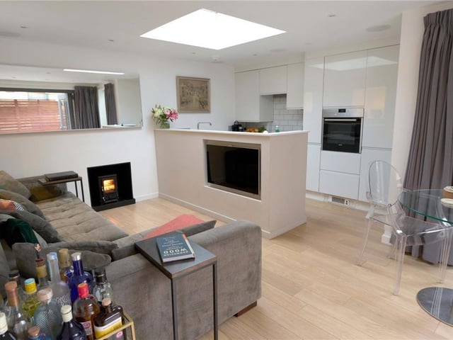 Open plan living, dining and kitchen area.