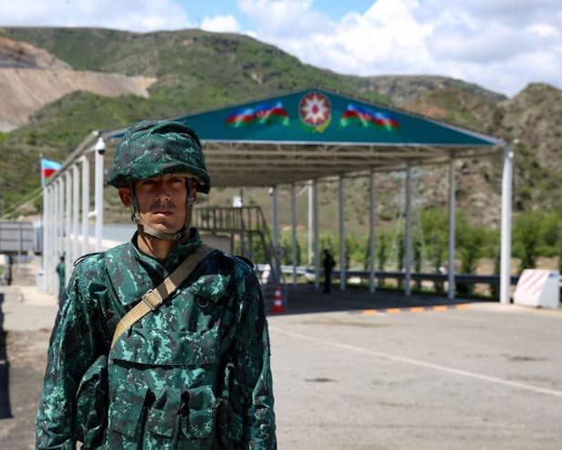 A view of an Azerbaijani checkpoint recently set up at the entry of the Lachin corridor, the Armenian-populated breakaway Nagorno-Karabakh region's only land link with Armenia. Armenia and Azerbaijan have fought two wars over the mountainous enclave of Karabakh.