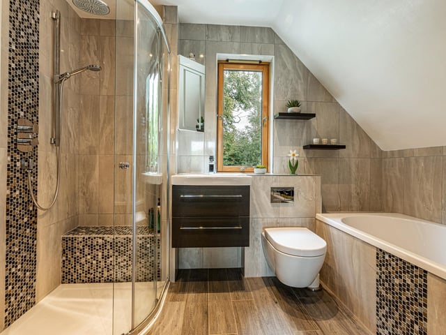 Exterior: A generously sized landscaped garden features flower and shrub beds, a vegetable plot and lawn, and there is a double garage.
Contact: Re/Max