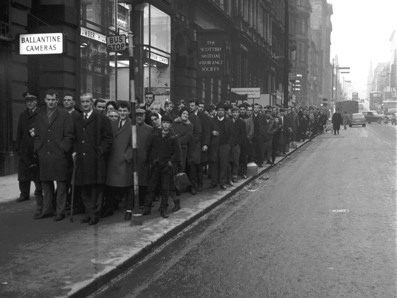 Celtic and Rangers fans queue up for tickets for the game on New Years' Day, 1965