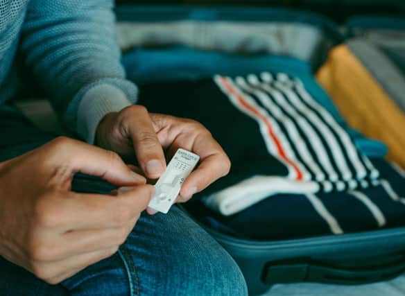 Day 2 Test: When do I need to take my day two Covid test? How much does the Covid travel test cost - and where can I get one? (Image credit: Canva Pro)