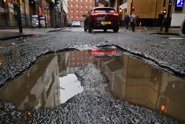 Pothole on Howard Street near St Enoch Square in Glasgow city centre on Tuesday. (Photo by John Devlin/The Scotsman)