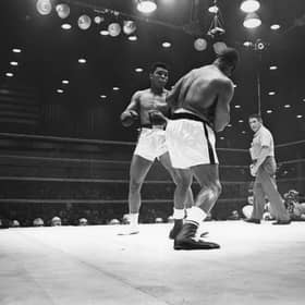 Muhammad Ali, then known as Cassius Clay, on his way to defeating Sonny Liston during their world heavyweight title fight at Miami Beach, Florida (Picture: Harry Benson/Getty Images)