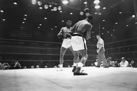 Muhammad Ali, then known as Cassius Clay, on his way to defeating Sonny Liston during their world heavyweight title fight at Miami Beach, Florida (Picture: Harry Benson/Getty Images)