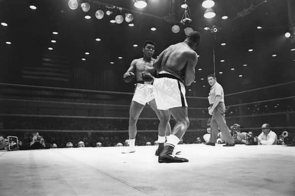 Muhammad Ali, then known as Cassius Clay, on his way to defeating Sonny Liston during their world heavyweight title fight at Miami Beach, Florida (Picture: Harry Benson/Getty Images)
