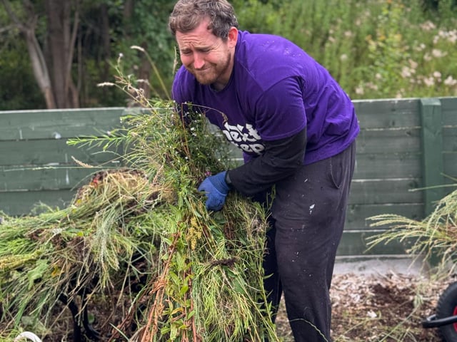 Teens+ staff and volunteers clearing the site