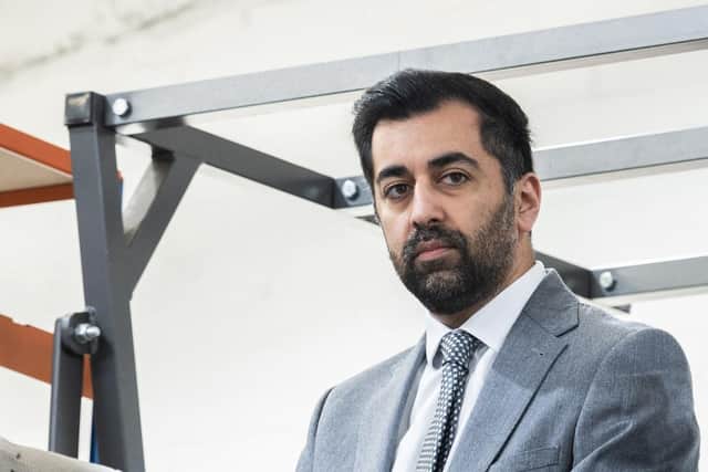 First Minister Humza Yousaf and Energy Secretary Neil Gray, right, alongside CEO Simon Forrest during a visit to tidal energy company Nova Innovation in Edinburgh
