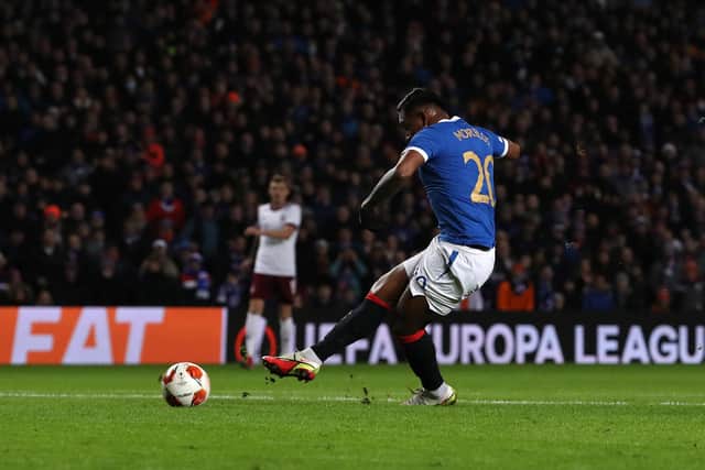 GLASGOW, SCOTLAND - NOVEMBER 25: Alfredo Morelos of Rangers scores their side's first goal from the penalty spot during the UEFA Europa League group A match between Rangers FC and Sparta Praha at Ibrox Stadium on November 25, 2021 in Glasgow, Scotland. (Photo by Ian MacNicol/Getty Images)