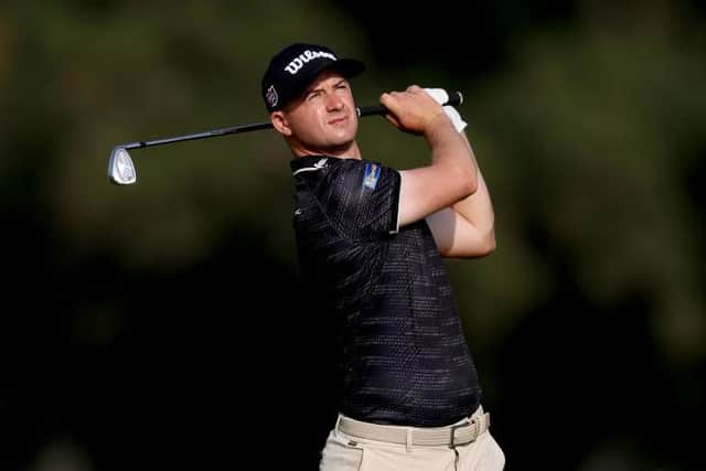 David Law plays his second shot on the 16th hole on day two of the Ras Al Khaimah Championship at Al Hamra Golf Club in the United Arab Emirates. Picture: Warren Little/Getty Images.