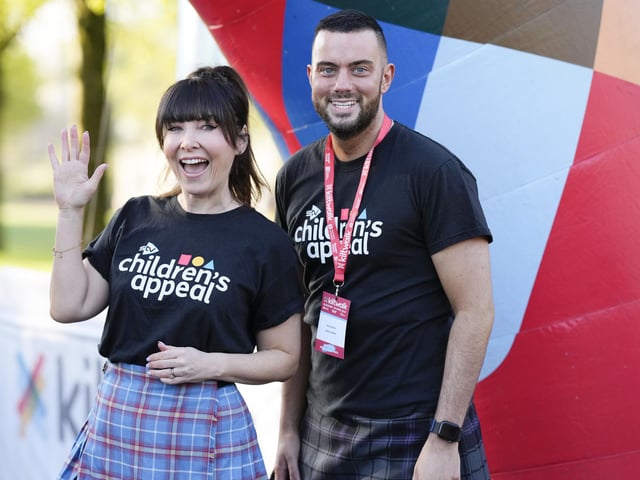 Laura Boyd and Phillip Petr from STV at the Glasgow Green start line