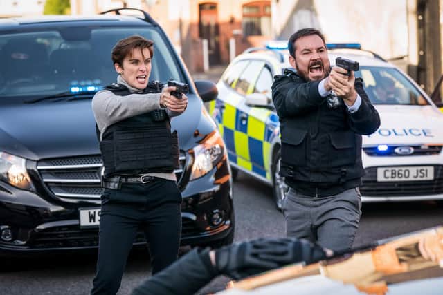 Vicky McClure as DI Kate Fleming and Martin Compston as DI Steve Arnott in Line of Duty, BBC's hit crime drama.