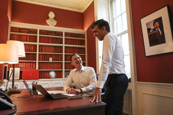 Prime Minister Rishi Sunak speaks with the Chancellor of the Exchequer Jeremy Hunt in the Chancellors Office.