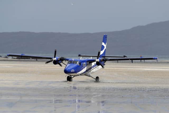 BARRA, SCOTLAND - JUNE 4: The plane carrying the coffin of Eilidh MacLeod arrives at Traigh Mhor beach near Barra airport  on June 4, 2017 in Barra, Scotland. The body of the Manchester bomb victim was flown home to the devastated community on the island of Barra ahead of her funeral. The 14-year-old was among 22 people who died in the terrorist attack at the Ariana Grande concert on Monday May 22, which also left dozens injured. Photo by Andrew Milligan - WPA Pool / Getty Images)