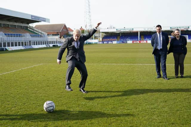 Prime Minister Boris Johnson kicking a football during a visit to the Hartlepool United Football Club. Picture: PA