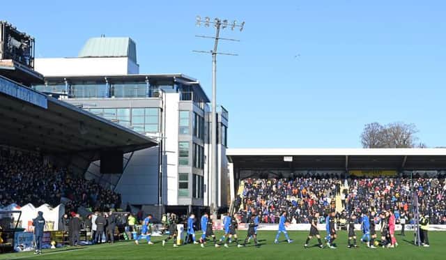 Rangers and Livingston make their way out the tunnel during a Cinch Premiership match at Toni Macaroni Arena.  (Photo by Rob Casey / SNS Group)