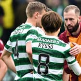 Motherwell forward Kevin van Veen shakes Celtic striker Kyogo Furuhashi's hand after the 1-1 draw at Parkhead.