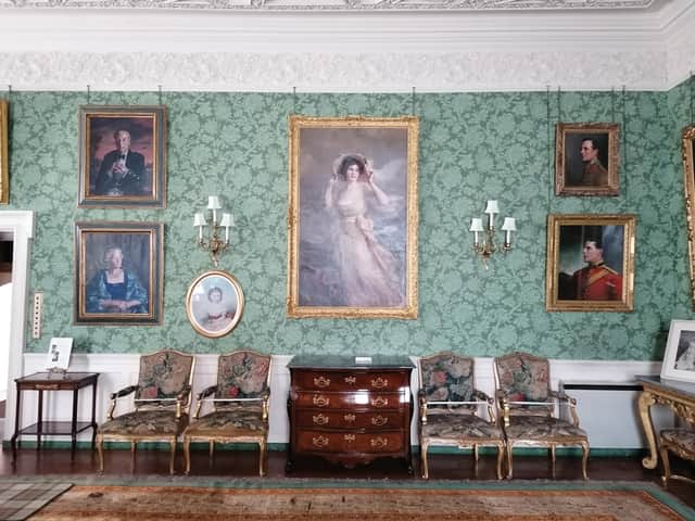 The portrait of Lorna Marsali at Fyvie Castle in Aberdeeshire. Her mother, Ethel Louise, Lady Forbes-Leith, looks on from the painting bottom left. The two women were estranged given disapproval over Marsali's choice of husband with the portrait never shown at Fyvie - until now - as a result. PIC: NTS.