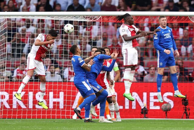 Edson Alvarez heads past Rangers goalkeeper John McLaughlin for the Ajax opener. (Photo by Dean Mouhtaropoulos/Getty Images)