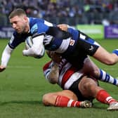 Bath's Finn Russell is tackled by George McGuigan during the Gallagher Premiership match  at The Recreation Ground. (Photo by David Rogers/Getty Images)