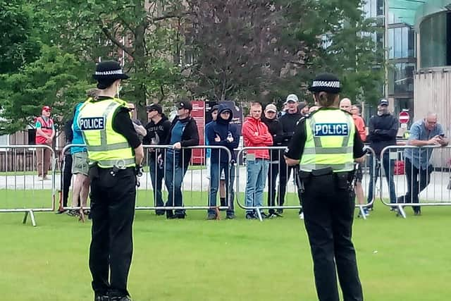 A small group of “counter-protesters” have gathered to heckle a Black Lives Matter demonstration in Edinburgh’s St Andrew Square.