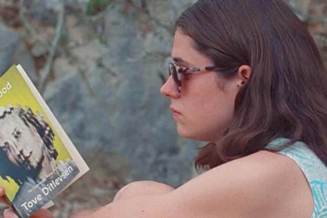 Frances reading on holiday in Croatia in Conversations with Friends (BBC)