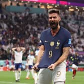 Olivier Giroud celebrates after scoring France's second goal against England. It proved the winner as France reached the semi-final of the World Cup, where they play Morocco  (Photo by Catherine Ivill/Getty Images)