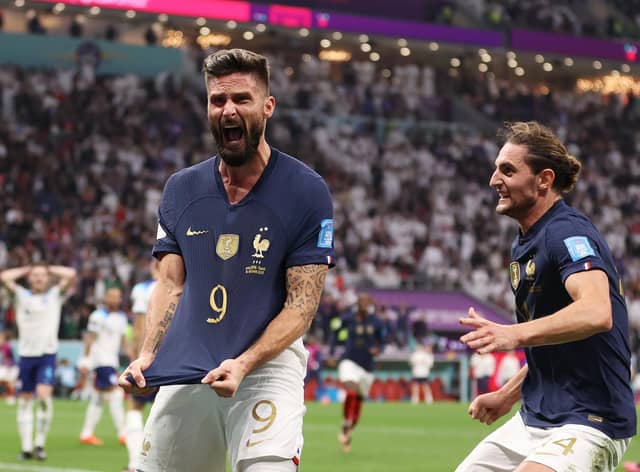 Olivier Giroud celebrates after scoring France's second goal against England. It proved the winner as France reached the semi-final of the World Cup, where they play Morocco  (Photo by Catherine Ivill/Getty Images)