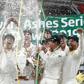 Tim Paine of Australia lifts the Urn after Australia drew the series to retain the Ashes at The Oval on September 15, 2019 (Photo by Ryan Pierse/Getty Images)