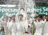 Tim Paine of Australia lifts the Urn after Australia drew the series to retain the Ashes at The Oval on September 15, 2019 (Photo by Ryan Pierse/Getty Images)