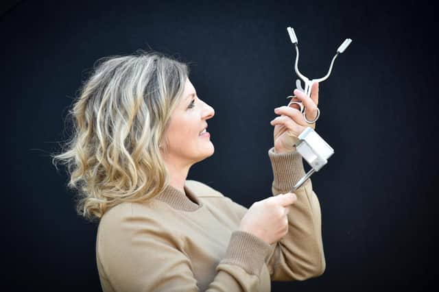 Michelle Ward of Clear Surgical, which recently became the first client of the new multi-million-pound Medical Device Manufacturing Centre based in the School of Engineering and Physical Sciences at Heriot-Watt’s Edinburgh campus, with the OpLight advanced surgical device. Picture: Julie Howden