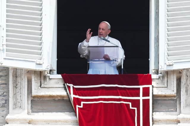 Pope Francis delivers the Sunday Angelus prayer from the window of his study overlooking St.Peter's Square at the Vatican on July 4, 2021. (Photo by Andreas SOLARO / AFP)