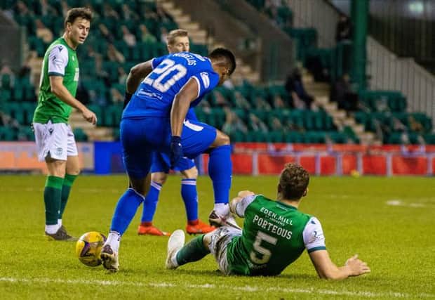 Rangers' Alfredo Morelos appears to stand on Hibernian's Ryan Porteous during a Scottish Premiership match between Hibernian and Rangers at Easter Road, on January 27, 2021, in Edinburgh, Scotland (Photo by Craig Williamson / SNS Group)