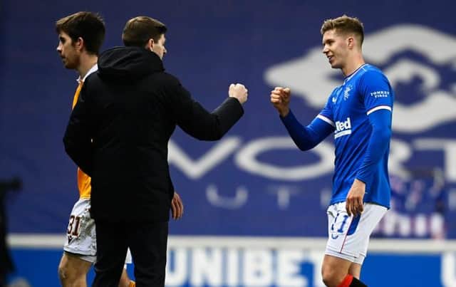 Cedric Itten is congratulated by Rangers manager Steven Gerrard for his contribution to the Ibrox club's 3-1 win over Motherwell which extended their lead at the top of the Premiership. (Photo by Rob Casey / SNS Group)