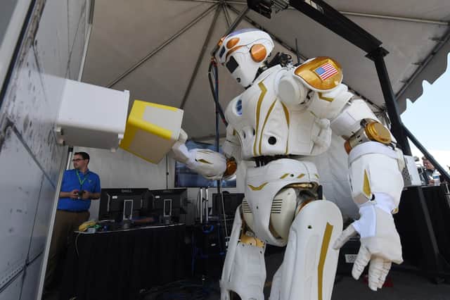 Nasa 'Valkyrie' robots like this one could one day help to establish human colonies on Mars (Picture: Mark Ralston/AFP via Getty Images)