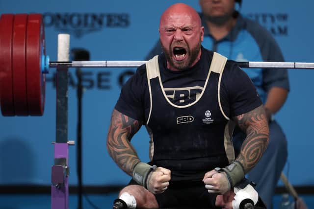 Team Scotland flag bearer and bronze medallist Micky Yule celebrates a lift during the Men's Para Powerlifting Heavyweight Final. (Photo by Al Bello/Getty Images)
