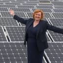 Principal Angela Cox is pictured surrounded by solar panels on the roof of Borders college, ahead of launching the institution's ambitious new sustainability strategy