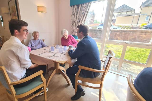 MP for Falkirk, Euan Stainbank at HC-One Scotland’s Kinnaird Manor Care Home speaking to residents