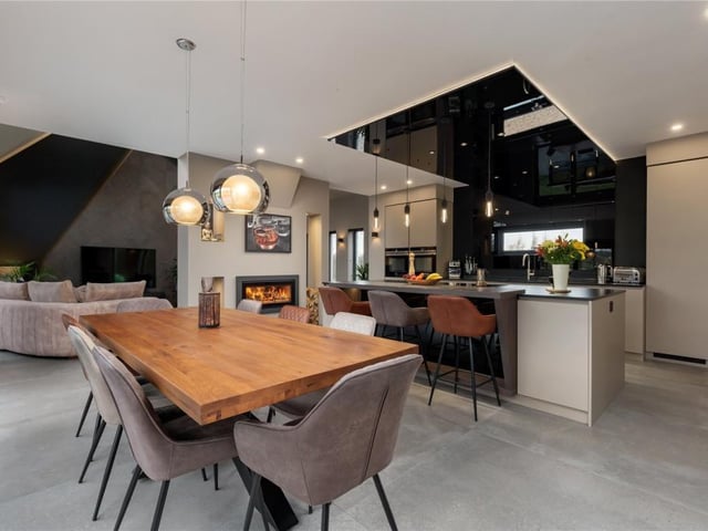 The kitchen has plenty of space for a dining table.
