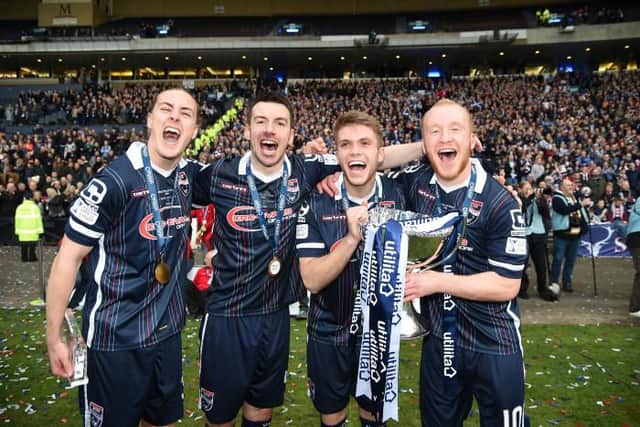 Marcus Fraser (second from right) celebrates Ross County's 2016 League Cup Final win over Hibs with team-mates (left to right) Jackson Irvine, Paul Quinn and Liam Boyce. (Photo by Rob Casey/SNS Group).