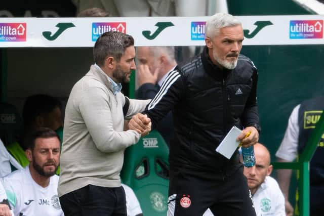 Hibs manager Lee Johnson shakes hands with his Aberdeen counterpart Jim Goodwin following the league match at Easter Road in September. Photo by Mark Scates / SNS Group