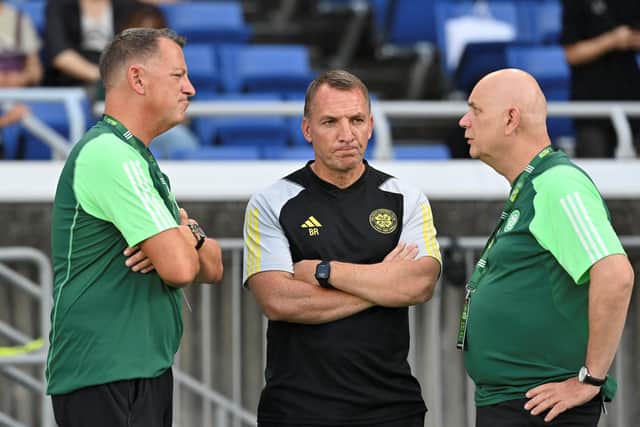 Celtic manager Brendan Rodgers (middle) ponders his side's 6-4 friendly defeat to Yokohama F Marinos at the Nissan Stadium. (Photo by KAZUHIRO NOGI/AFP via Getty Images)