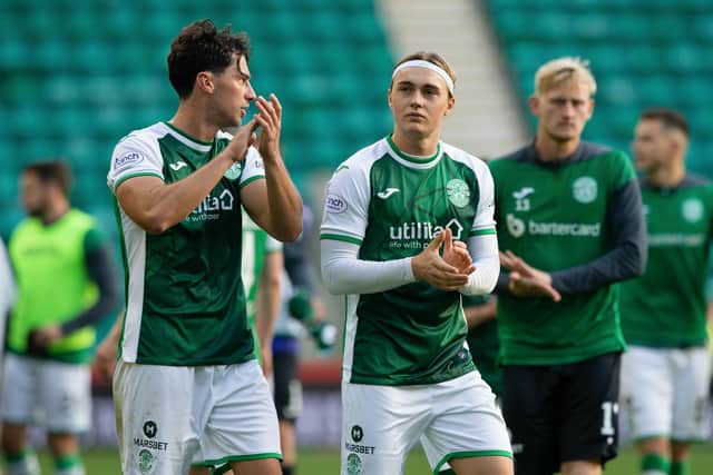 Joe Newell, left, applauds the Hibs fans after defeating Motherwell 1-0 at Easter Road.