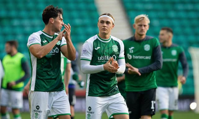 Joe Newell, left, applauds the Hibs fans after defeating Motherwell 1-0 at Easter Road.