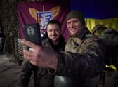 Ukrainian president Volodymyr Zelensky posing for a selfie picture with a Ukrainian soldier as he visits the Donetsk region, amid the Russian invasion of Ukraine. Picture: Stringer/Ukrainian Presidential Press Ser/AFP via Getty Images
