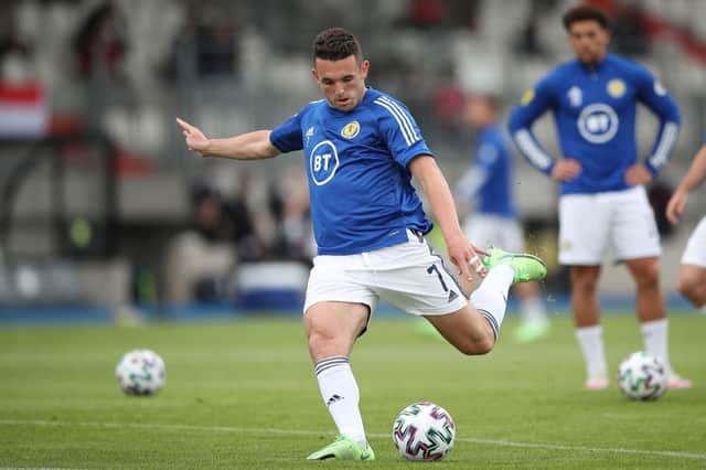 John McGinn of Scotland shoots as he warms up prior to the international friendly match between Luxembourg and Scotland at Stade Josy Barthel on June 06, 2021 in Luxembourg, Luxembourg. (Photo by Christian Kaspar-Bartke/Getty Images)