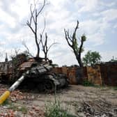 A destroyed tank is pictured in the village of Novoselivka, outside Chernigiv, on June 21, 2022, amid the Russian invasion of Ukraine. (Photo by Sergei CHUZAVKOV / AFP) (Photo by SERGEI CHUZAVKOV/AFP via Getty Images)