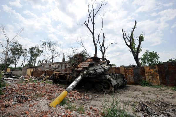 A destroyed tank is pictured in the village of Novoselivka, outside Chernigiv, on June 21, 2022, amid the Russian invasion of Ukraine. (Photo by Sergei CHUZAVKOV / AFP) (Photo by SERGEI CHUZAVKOV/AFP via Getty Images)