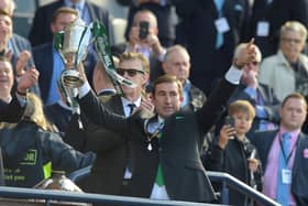 Former Hibs manager Alan Stubbs lifts the Scottish Cup after a historic win in 2016.