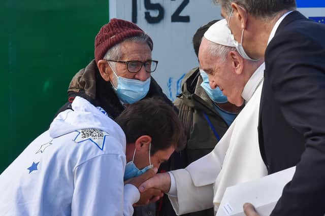 Pope Francis meets refugees at a reception centre on the island of Lesbos during a visit to Greece, when he called for better treatment of migrants by European countries (Picture: Andreas Solaro/AFP via Getty Images)